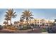 Vibrant town center with palm trees, boutiques, and outdoor seating, creating a lively community atmosphere at 11716 Strandhill Ct, Lakewood Ranch, FL 34202