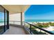 Relax on this breezy balcony overlooking the ocean, beach, and pool, a true seaside paradise at 1211 Gulf Of Mexico Dr # 309, Longboat Key, FL 34228