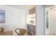 Dry bar with wine fridge and storage at 1211 Gulf Of Mexico Dr # 309, Longboat Key, FL 34228