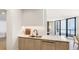 Bright and modern kitchen with a view of the ocean at 1211 Gulf Of Mexico Dr # 309, Longboat Key, FL 34228