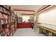 Library and workshop room featuring bookshelves, storage, and a work bench at 1211 Gulf Of Mexico Dr # 309, Longboat Key, FL 34228