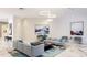 Comfortable lobby featuring stylish sofas, a decorative rug, and elegant artwork at 1211 Gulf Of Mexico Dr # 309, Longboat Key, FL 34228