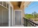 Cozy balcony features black metal railing and access to the bedroom, a perfect retreat at 1268 11Th St # 2402, Sarasota, FL 34236
