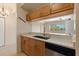 Cozy kitchen view to the living space with stainless steel appliances and plenty of cabinet space at 1268 11Th St # 2402, Sarasota, FL 34236