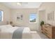 Comfortable bedroom with a large bed, stylish decor, and bright natural light at 1268 11Th St # 2402, Sarasota, FL 34236