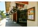 Attractive storefront with decorative awnings and artistic displays enhancing the street's charm at 1268 11Th St # 2402, Sarasota, FL 34236