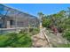 Beautifully landscaped backyard and gardens at 13 Bayhead Ln, Osprey, FL 34229