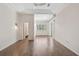 Bright bedroom with hardwood floors, ample natural light, and walk-in closet at 13 Bayhead Ln, Osprey, FL 34229