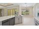 Charming breakfast nook with bay window overlooking the pool and patio provides natural light at 13 Bayhead Ln, Osprey, FL 34229