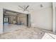 Open patio featuring tile flooring, a ceiling fan, and a view of the living room at 13 Bayhead Ln, Osprey, FL 34229