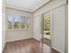 Cozy sun room with bright windows and a view of the backyard at 13 Bayhead Ln, Osprey, FL 34229