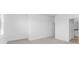 Bright bedroom features neutral carpet, light walls, and window to let natural light flood the space at 14783 Lyla Ter, Bradenton, FL 34211