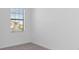 Bright bedroom featuring a window with natural light at 14783 Lyla Ter, Bradenton, FL 34211