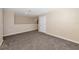 Spacious loft area boasting plush carpeting, neutral walls, and abundant natural light at 15118 Agave Grove Pl, Bradenton, FL 34212