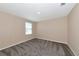 Inviting bedroom offering comfortable carpeting and a well-lit space with a window for natural light at 15118 Agave Grove Pl, Bradenton, FL 34212