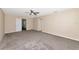 Spacious bedroom featuring neutral walls, plush carpet, and doors at 15118 Agave Grove Pl, Bradenton, FL 34212