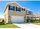 Beautifully landscaped two-story home featuring a spacious two-car garage at 15118 Agave Grove Pl, Bradenton, FL 34212