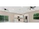 The spacious kitchen boasts modern appliances, a breakfast bar, and easy access to the backyard at 158 Chickering St, Port Charlotte, FL 33954