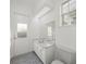Bathroom with double sink vanity and natural light at 1693 Landings Ln, Sarasota, FL 34231