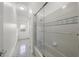 Bathroom with tub and shower combination and access to the backyard at 1693 Landings Ln, Sarasota, FL 34231