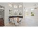 Breakfast nook features built in seating and oversized windows at 1693 Landings Ln, Sarasota, FL 34231