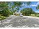 Community entrance gate with lush landscaping and a well-maintained entry point at 1693 Landings Ln, Sarasota, FL 34231