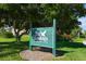 The Landings Racquet Club community sign surrounded by lush landscaping at 1693 Landings Ln, Sarasota, FL 34231
