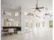 Open living area featuring breakfast nook and access to the backyard at 1693 Landings Ln, Sarasota, FL 34231