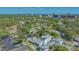 Scenic aerial view showcasing the home's location, set amongst lush greenery and city skyline at 1755 7Th St, Sarasota, FL 34236