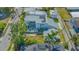 Aerial view highlighting the home's architecture, landscaping, and outdoor living spaces at 1755 7Th St, Sarasota, FL 34236