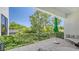 Relaxing outdoor balcony area with modern furniture and privacy screen at 1755 7Th St, Sarasota, FL 34236