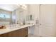 Modern bathroom with double sink vanity, ample lighting, and accessible design at 1755 7Th St, Sarasota, FL 34236