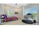 Bright bedroom with a large window and a workspace; perfect for studying or work at 1755 7Th St, Sarasota, FL 34236
