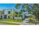 Stunning exterior showcasing the modern architecture and well-manicured lawn of the home at 1755 7Th St, Sarasota, FL 34236