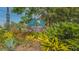 Entrance sign to Gillespie Park, showcasing lush greenery and vibrant landscaping at 1755 7Th St, Sarasota, FL 34236
