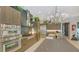 Stylish kitchen featuring stainless appliances, custom cabinets, and designer lighting at 1755 7Th St, Sarasota, FL 34236