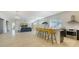 Spacious open kitchen with breakfast bar and sleek appliances, seamlessly connected to the living area at 1755 7Th St, Sarasota, FL 34236