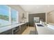 Modern kitchen with stainless steel appliances, sleek countertops, and a minimalist design at 1755 7Th St, Sarasota, FL 34236