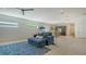 Open concept living room with seamless transition to the kitchen and bright natural light at 1755 7Th St, Sarasota, FL 34236