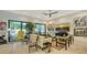 Bright living room with modern decor and a view of lush outdoor greenery at 1755 7Th St, Sarasota, FL 34236