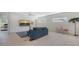 Open living room with modern furniture, large television, and ample natural light at 1755 7Th St, Sarasota, FL 34236