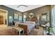 View of the main bedroom with dark walls, decorative rug, and seating at 1755 7Th St, Sarasota, FL 34236