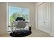 Well-lit home office space featuring large windows, a modern desk, and ample natural light at 1755 7Th St, Sarasota, FL 34236