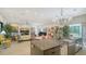 Bright, open-concept living space with a modern kitchen and dining area perfect for entertaining at 1755 7Th St, Sarasota, FL 34236