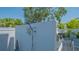 This home features a private outdoor shower with nearby dining and grilling area at 1755 7Th St, Sarasota, FL 34236