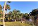Picturesque park with a wooden gazebo, lush tropical vegetation, and serene waterfront views at 1755 7Th St, Sarasota, FL 34236