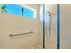 Elegant walk-in shower featuring stylish tile, sleek fixtures, and natural light at 1755 7Th St, Sarasota, FL 34236