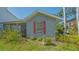 Charming single-story home with red window shutters and well-maintained landscaping at 1765 7Th St, Sarasota, FL 34236
