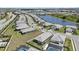 Aerial view of the community showcasing well-designed homes, scenic ponds, and perfectly planned streets at 17676 Savory Mist Cir, Bradenton, FL 34211