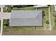 Aerial view of the home featuring a well-maintained roof, expansive backyard, and neighborhood layout at 17676 Savory Mist Cir, Bradenton, FL 34211